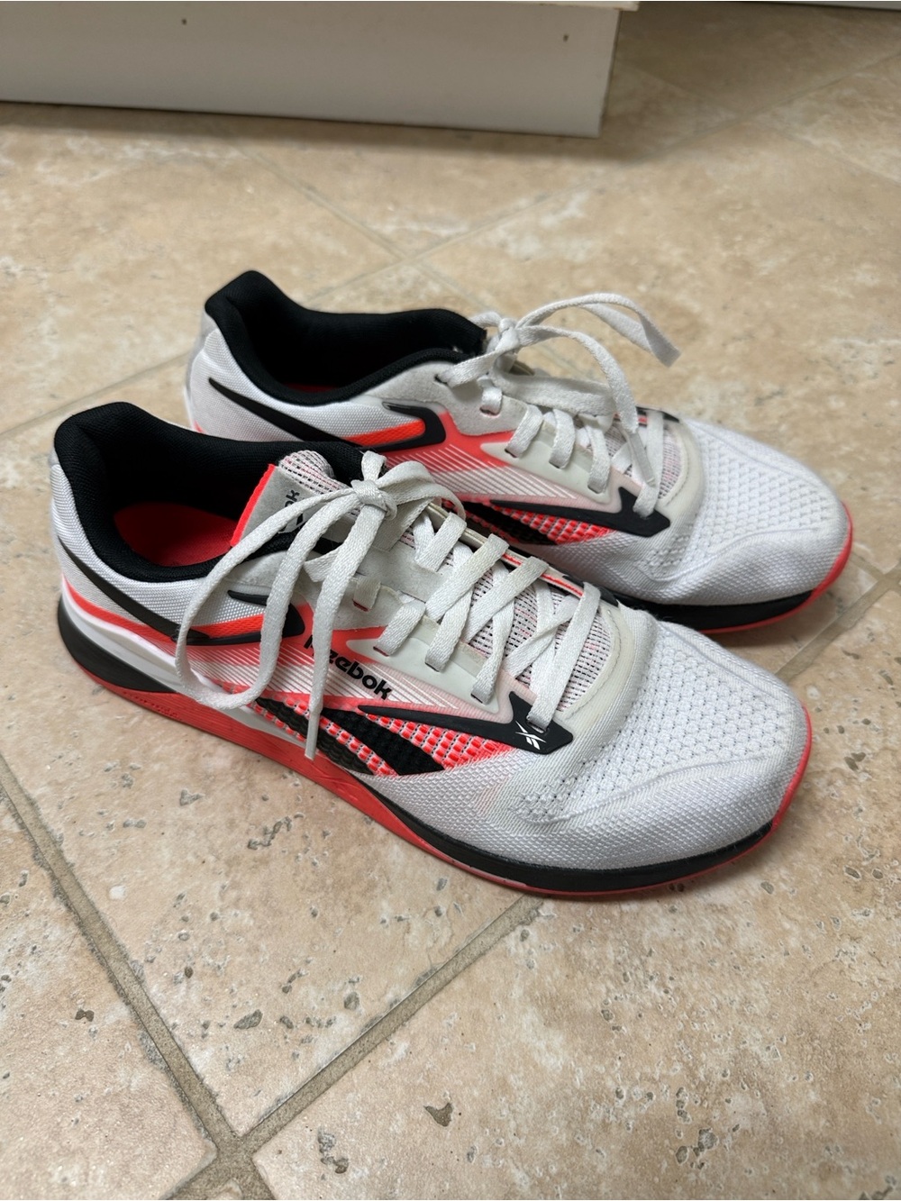 Reebok women’s White and orange nano4 Shoes